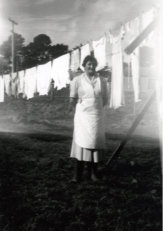 Mum in gumboots hanging washing Rydal 1950-1